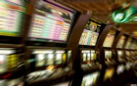 Five-reel grid and symbol paytable Wild West Gold five-reel slot interface with western theme symbols